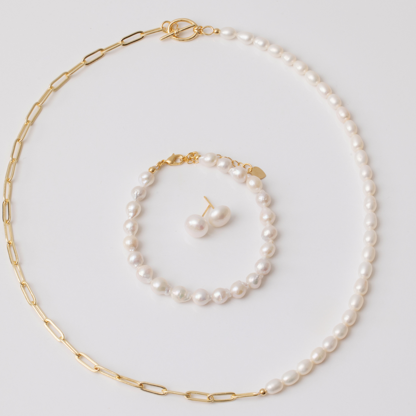 Paperclip chain with freshwater pearl necklace set pictured with bracelet and earrings