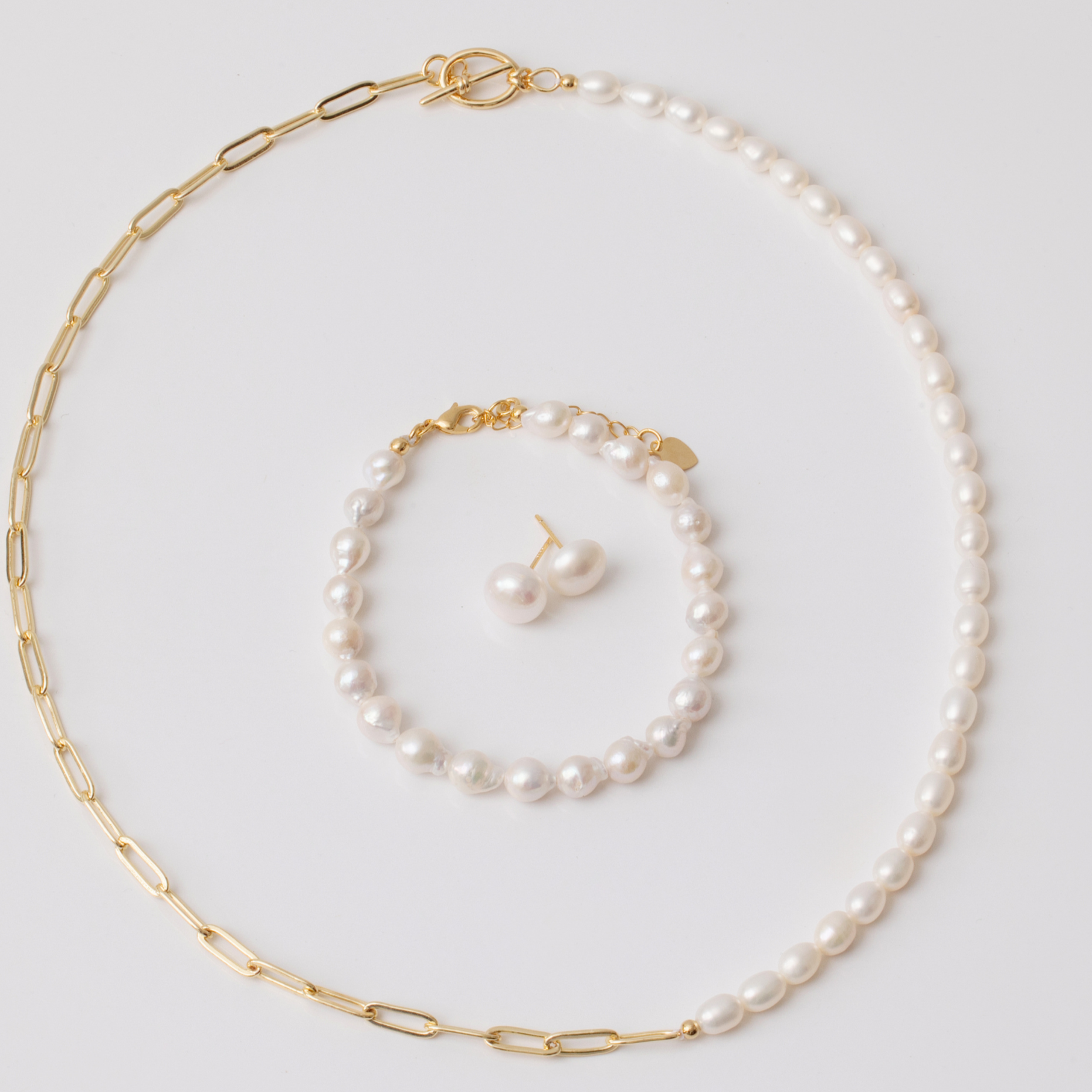 Paperclip chain with freshwater pearl necklace set pictured with bracelet and earrings