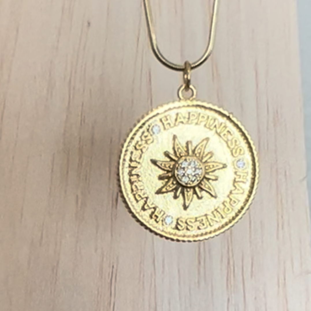 Round Gold Filled gold snake 18" or 20" chain with 1" coin pendant with the sun in middle and happiness inscribed around the outer edge.